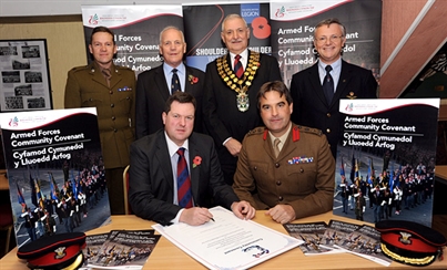 The Council’s Armed Forces Champion Cllr Craig Middle signing the Armed Forces Covenant  on behalf of Rhondda Cynon Taf Council.